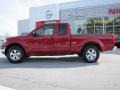 2009 Red Brick Nissan Frontier SE King Cab 4x4  photo #2