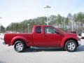 2009 Red Brick Nissan Frontier SE King Cab 4x4  photo #6