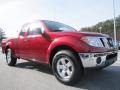 2009 Red Brick Nissan Frontier SE King Cab 4x4  photo #7