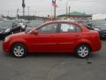 2011 Tropical Red Kia Rio   photo #10