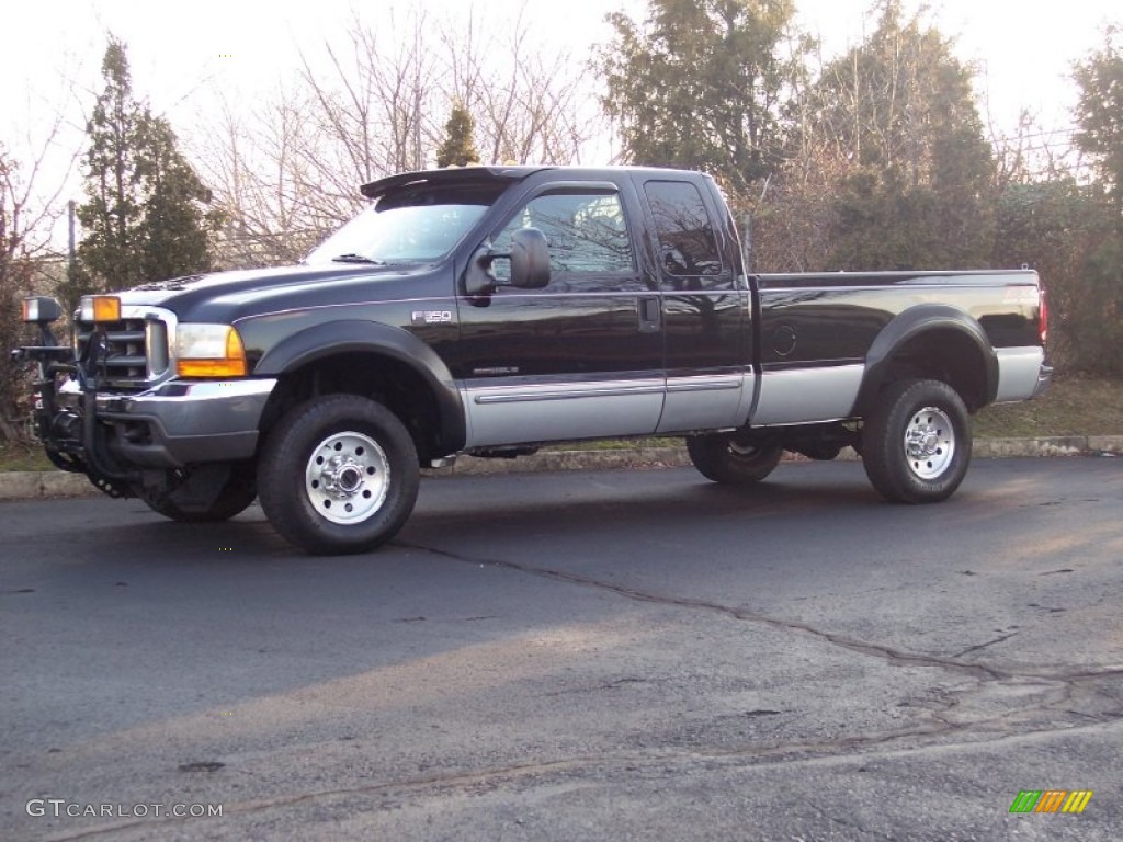 2000 F350 Super Duty XLT Extended Cab 4x4 - Black / Medium Graphite photo #1