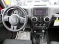 Black 2012 Jeep Wrangler Unlimited Sahara 4x4 Dashboard