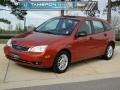 2005 Blazing Copper Metallic Ford Focus ZX5 SE Hatchback  photo #1