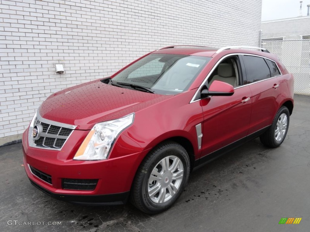 Crystal Red Tintcoat Cadillac SRX