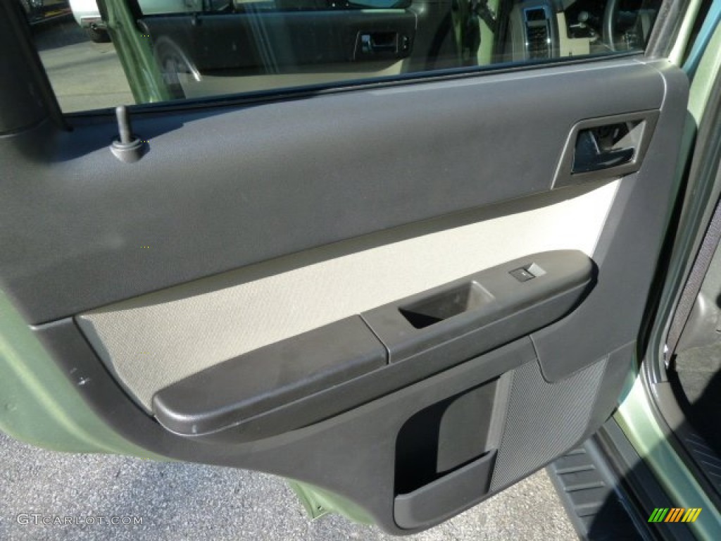 2010 Mariner I4 - Kiwi Green Metallic / Black photo #13