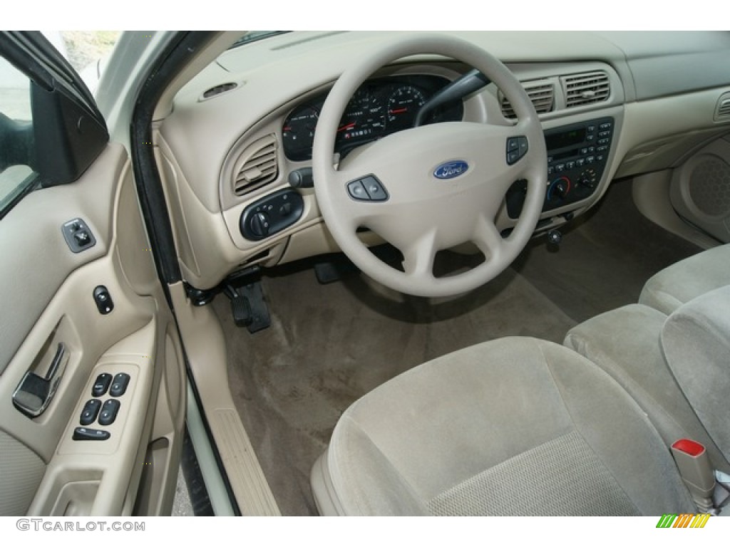 2003 Taurus SE - Gold Ash Metallic / Medium Parchment photo #4