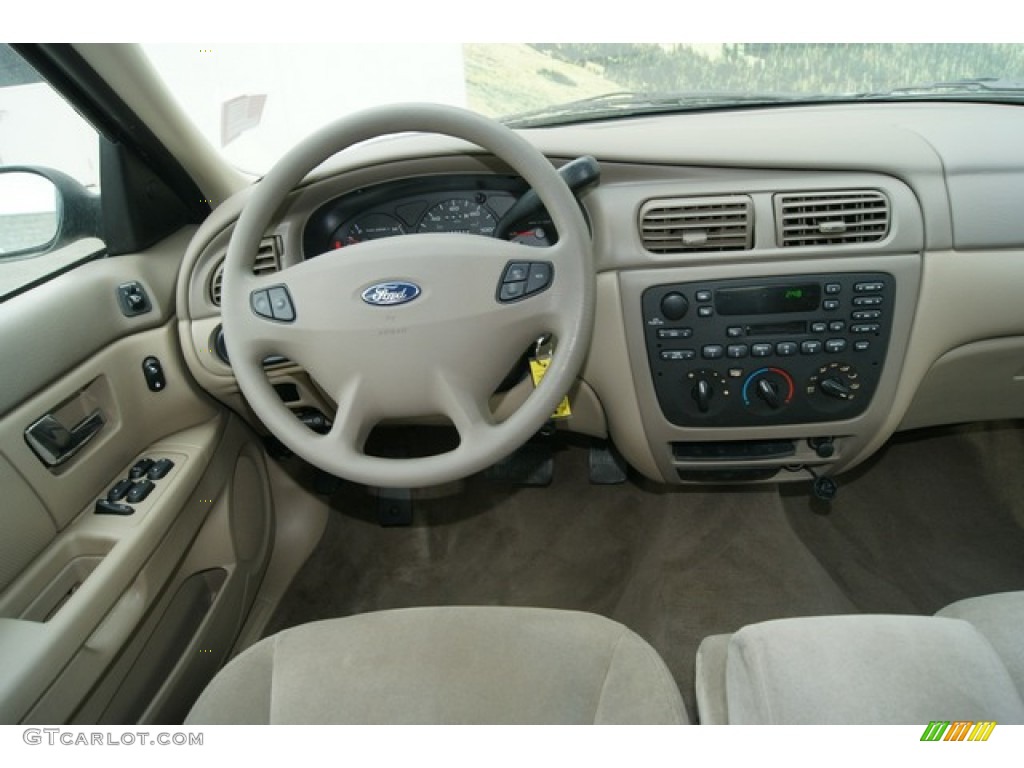 2003 Taurus SE - Gold Ash Metallic / Medium Parchment photo #18