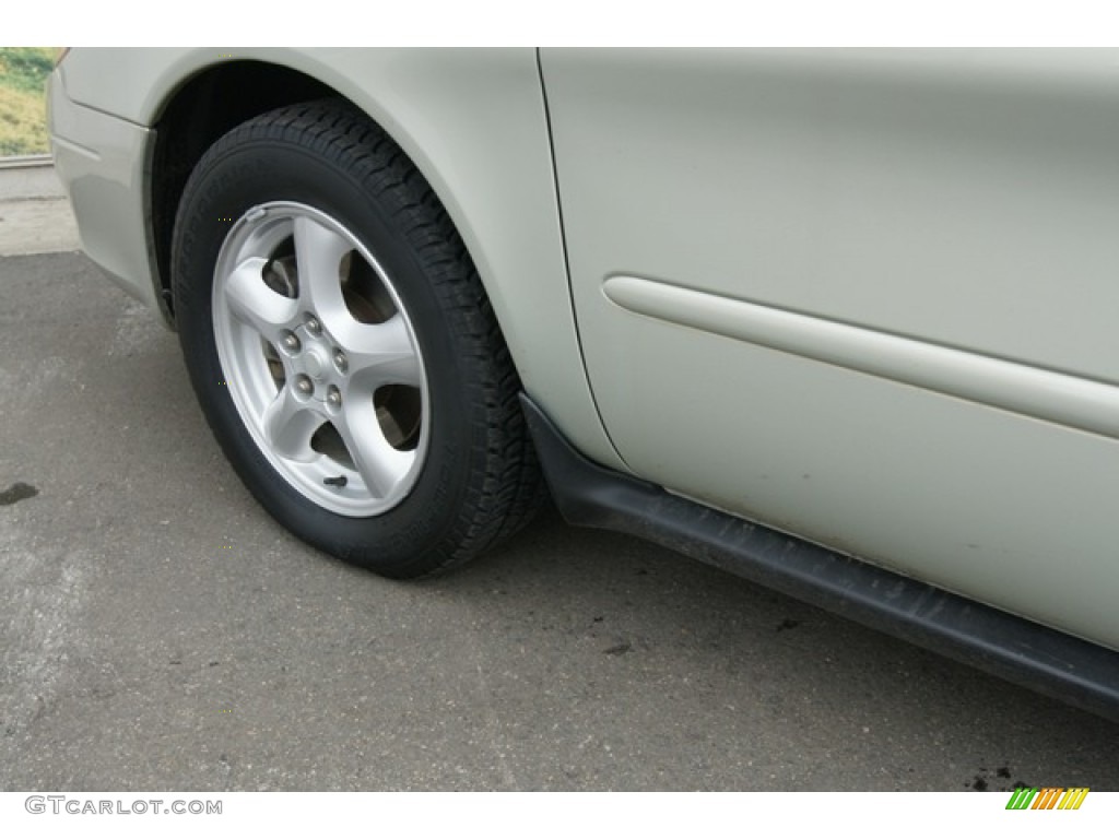 2003 Taurus SE - Gold Ash Metallic / Medium Parchment photo #23