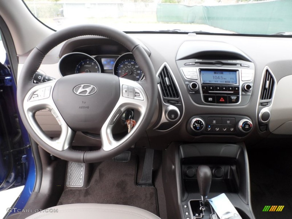 2012 Hyundai Tucson GLS Taupe Dashboard Photo #60747425