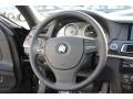 Black 2011 BMW 7 Series ActiveHybrid 750Li Sedan Steering Wheel