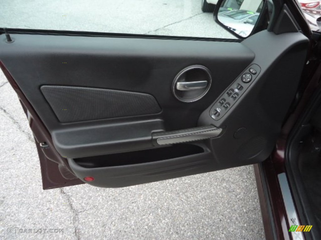 2006 Pontiac Grand Prix GXP Sedan Ebony Door Panel Photo #60794622
