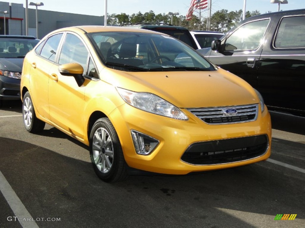 2011 Fiesta SEL Sedan - Yellow Blaze Metallic Tri-Coat / Charcoal Black/Blue Cloth photo #1