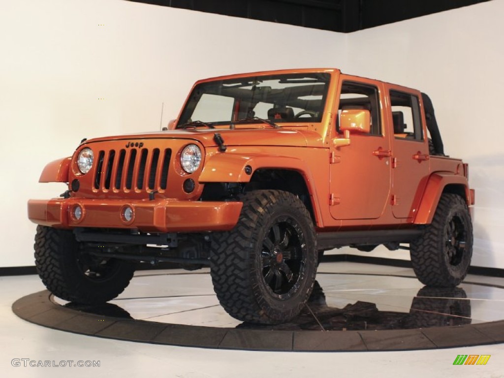 Mango Tango Pearl 2010 Jeep Wrangler Unlimited Mountain Edition 4x4 Exterior Photo #60821616