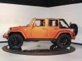 Mango Tango Pearl 2010 Jeep Wrangler Unlimited Mountain Edition 4x4 Exterior