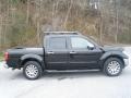 2010 Super Black Nissan Frontier LE Crew Cab  photo #2