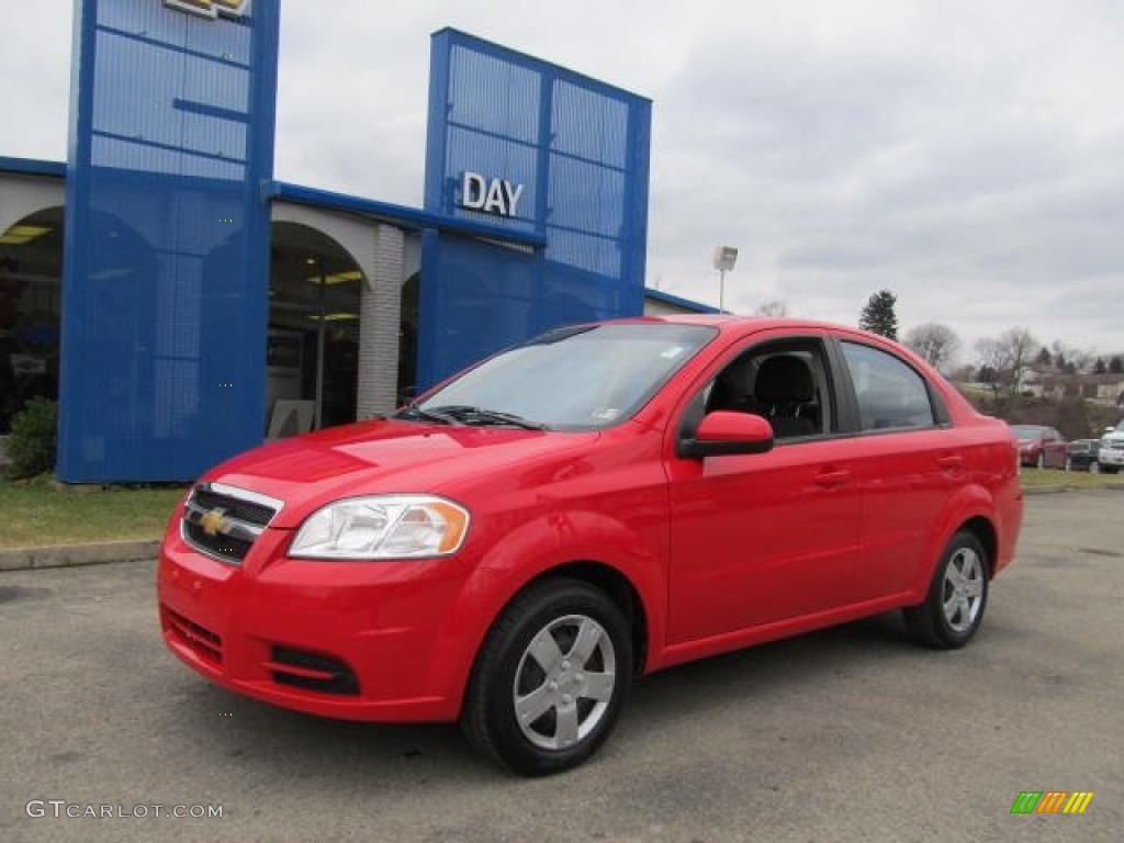 2010 Aveo LT Sedan - Victory Red / Charcoal photo #1