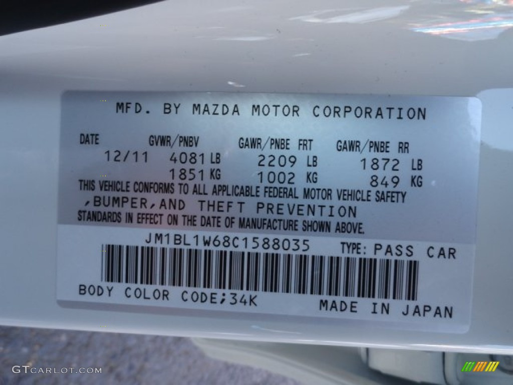 2012 MAZDA3 i Grand Touring 4 Door - Crystal White Pearl Mica / Black photo #17