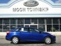2012 Sonic Blue Metallic Ford Focus SE Sedan  photo #1