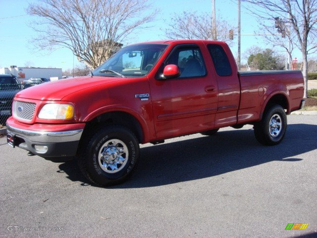 1999 F250 Super Duty XLT Extended Cab 4x4 - Red / Medium Graphite photo #6