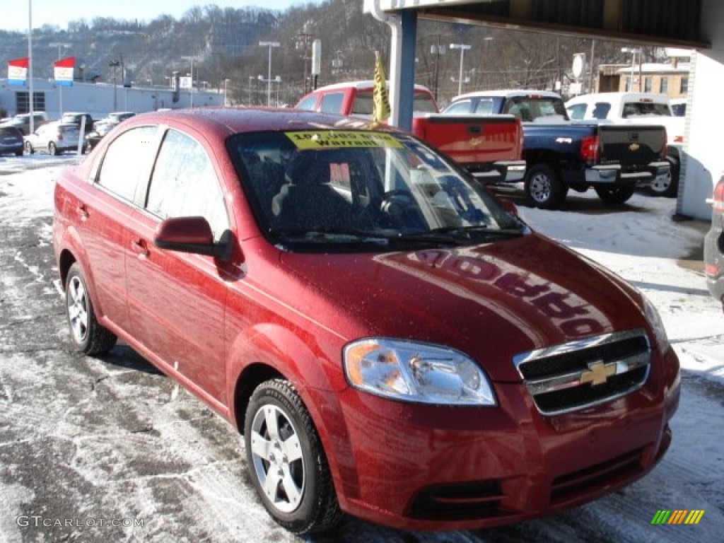2010 Aveo LT Sedan - Sport Red / Charcoal photo #2