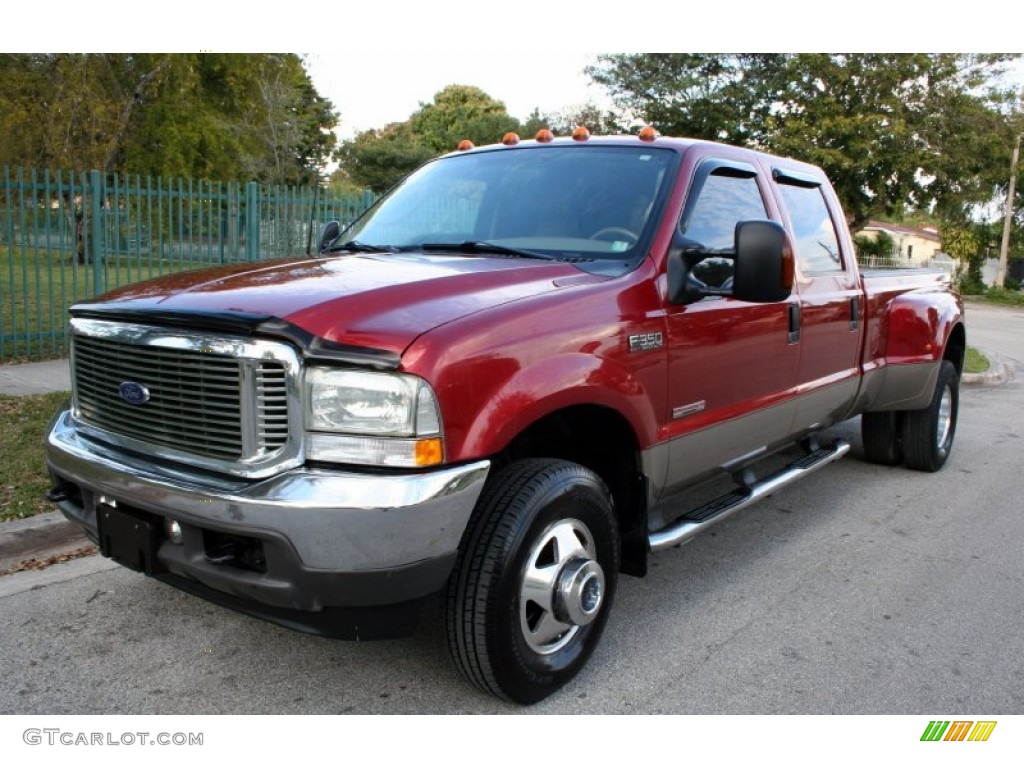 2003 F350 Super Duty Lariat Crew Cab 4x4 Dually - Toreador Red Metallic / Medium Parchment photo #1