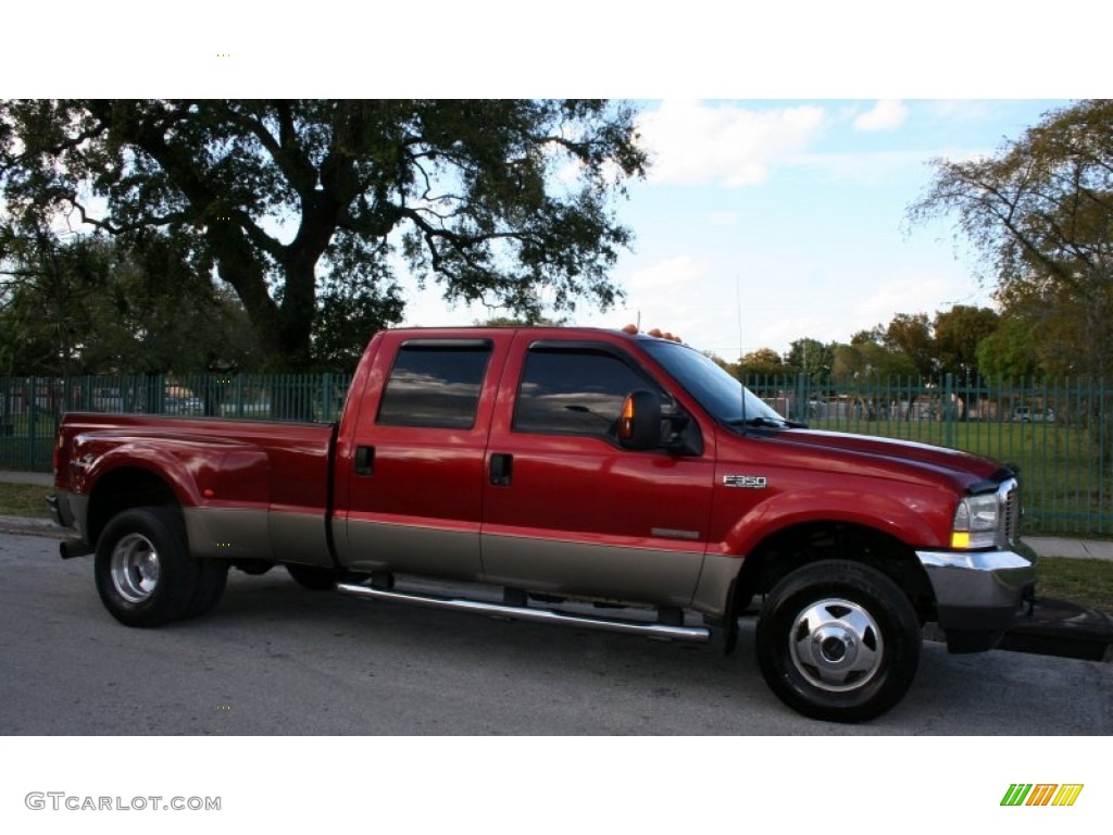 2003 F350 Super Duty Lariat Crew Cab 4x4 Dually - Toreador Red Metallic / Medium Parchment photo #13