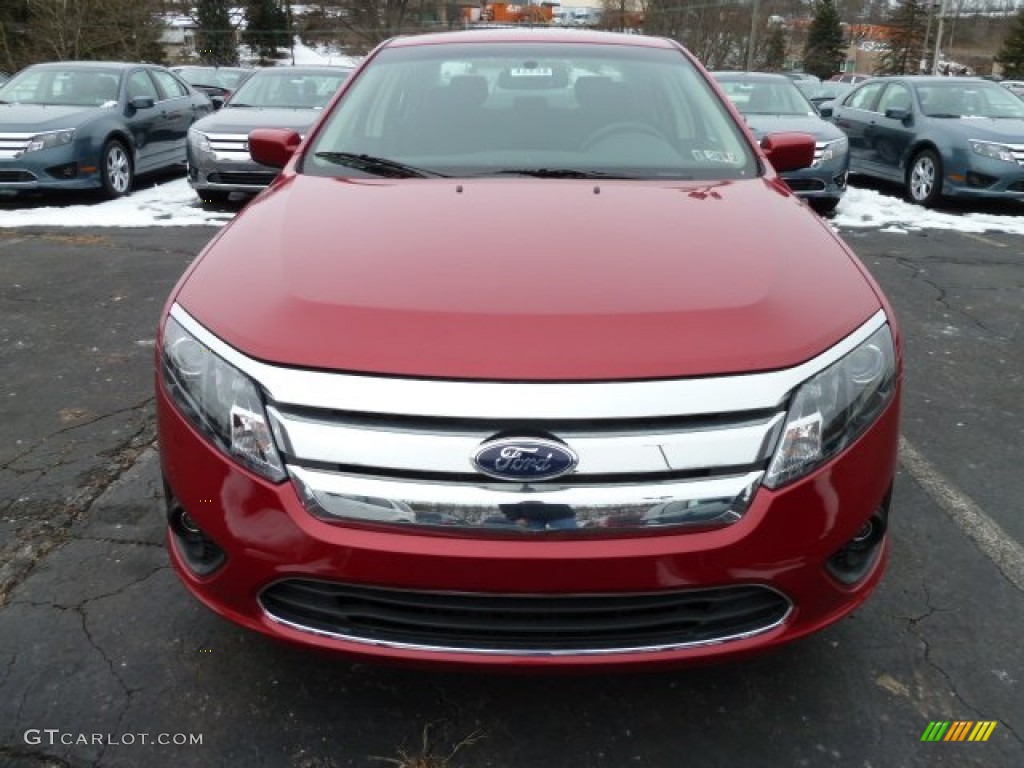 2012 Fusion SE - Red Candy Metallic / Charcoal Black photo #6