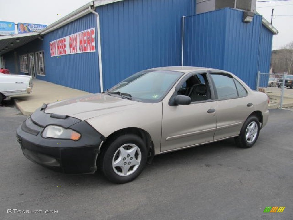 2004 Cavalier Sedan - Sandrift Metallic / Graphite photo #1