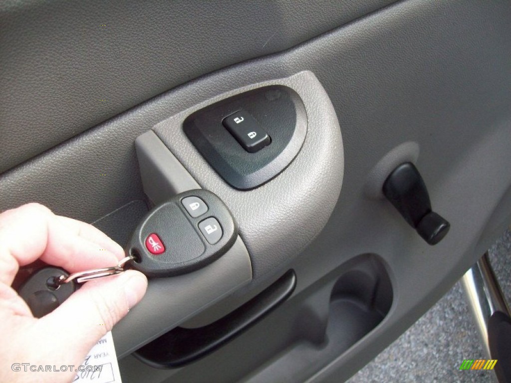 2007 Silverado 1500 Work Truck Extended Cab 4x4 - Doeskin Tan / Dark Titanium Gray photo #5