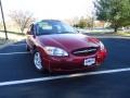 2002 Matador Red Metallic Ford Taurus SEL  photo #1