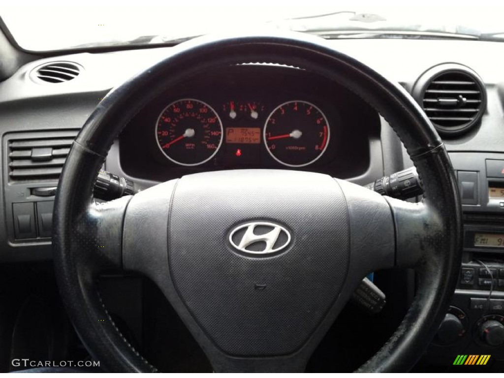 2003 Tiburon GT V6 - Super Silver / Black photo #24