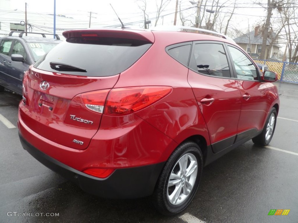 Garnet Red 2011 Hyundai Tucson GLS AWD Exterior Photo #61044253