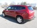 2009 Red Jewel Tintcoat Chevrolet Traverse LT  photo #3