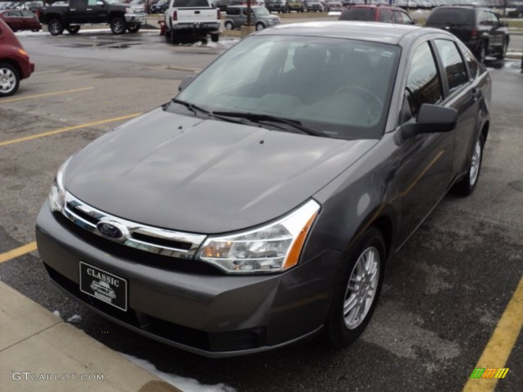 2010 Focus SE Sedan - Sterling Grey Metallic / Medium Stone photo #1