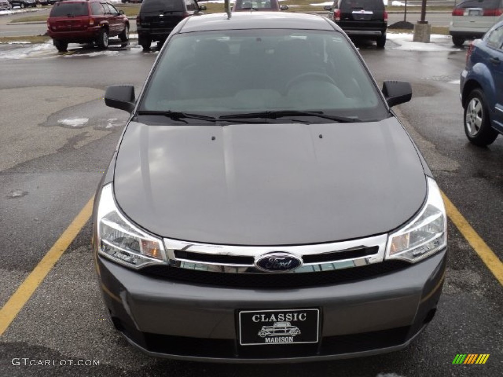 2010 Focus SE Sedan - Sterling Grey Metallic / Medium Stone photo #2