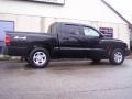 2005 Black Dodge Dakota ST Quad Cab 4x4  photo #27