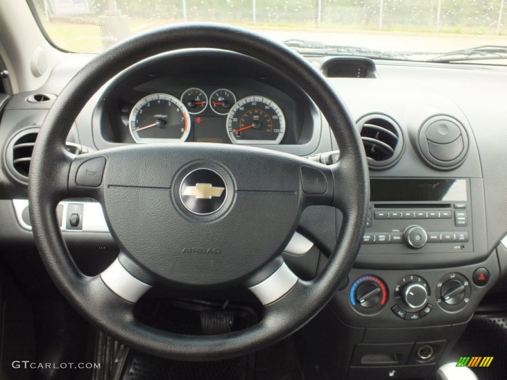 2010 Chevrolet Aveo LT Sedan Charcoal Steering Wheel Photo #61123799