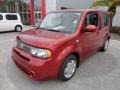 NAH - Cayenne Red Nissan Cube (2012)