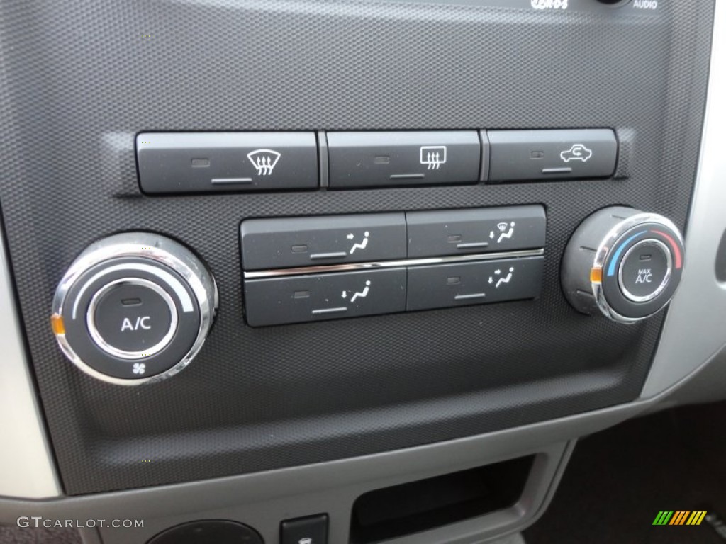 2012 Nissan Frontier SV Sport Appearance Crew Cab Controls Photo #61142240