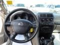 Dashboard of 2003 Frontier XE V6 King Cab 4x4