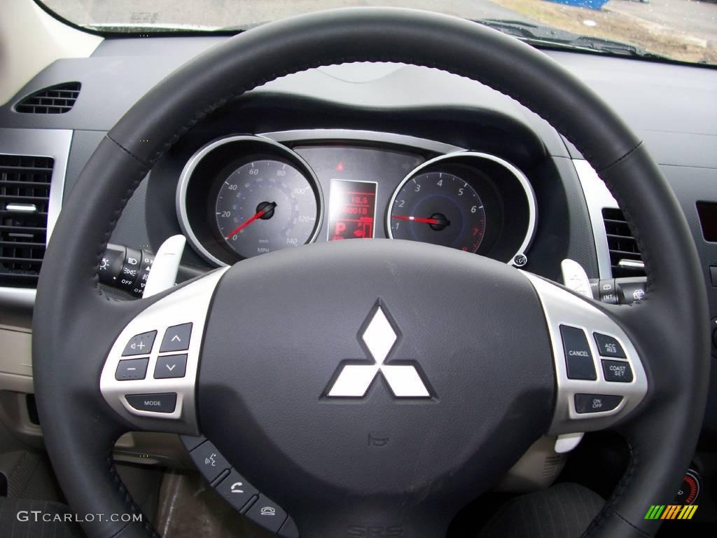 2009 Outlander SE 4WD - Desert Sand Beige Metallic / Beige photo #5