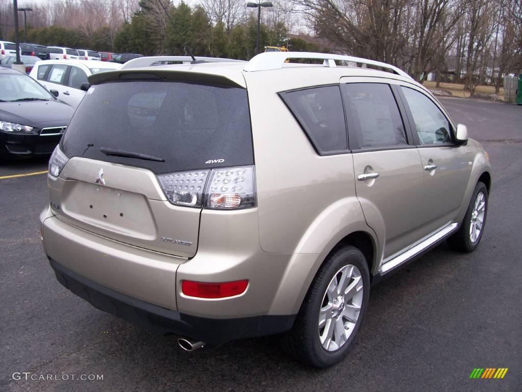 2009 Outlander SE 4WD - Desert Sand Beige Metallic / Beige photo #13