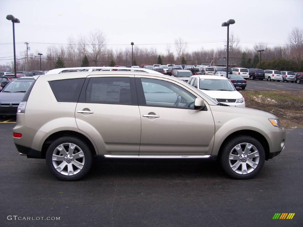 2009 Outlander SE 4WD - Desert Sand Beige Metallic / Beige photo #14