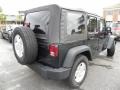 2010 Black Jeep Wrangler Unlimited Sport  photo #13