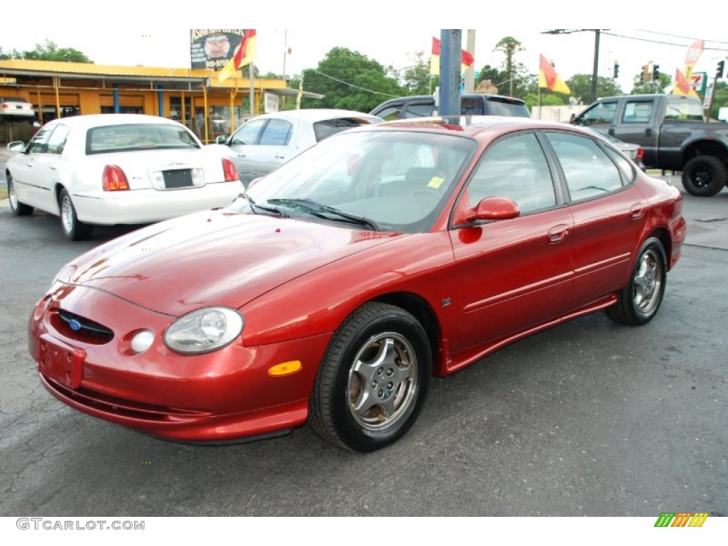 Toreador Red Metallic Ford Taurus