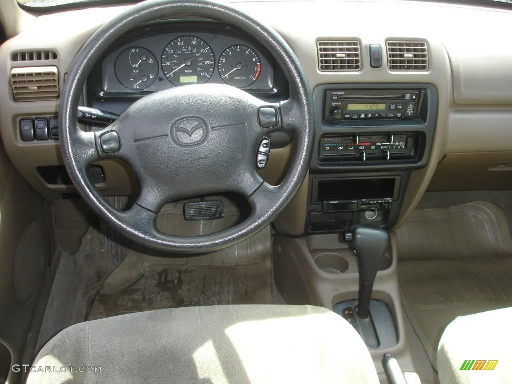 1998 Protege DX - Brilliant Black / Beige photo #17