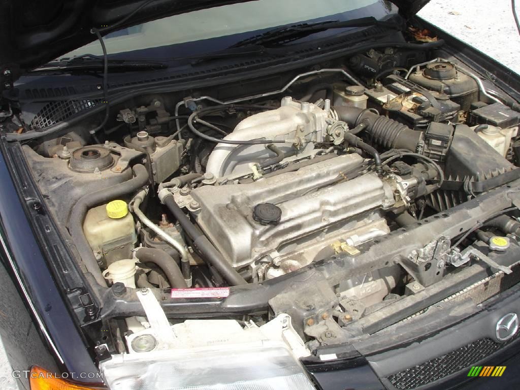 1998 Protege DX - Brilliant Black / Beige photo #20