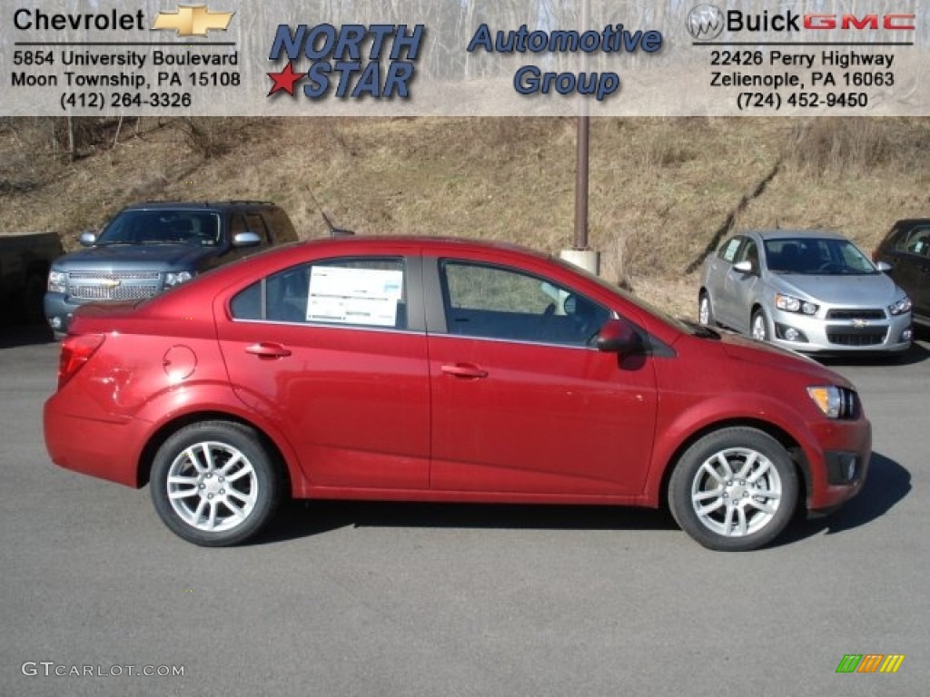 2012 Sonic LS Sedan - Crystal Red Tintcoat / Jet Black/Dark Titanium photo #1