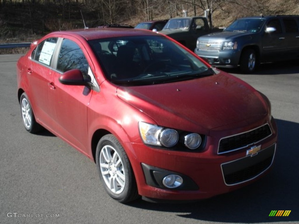 2012 Sonic LS Sedan - Crystal Red Tintcoat / Jet Black/Dark Titanium photo #2