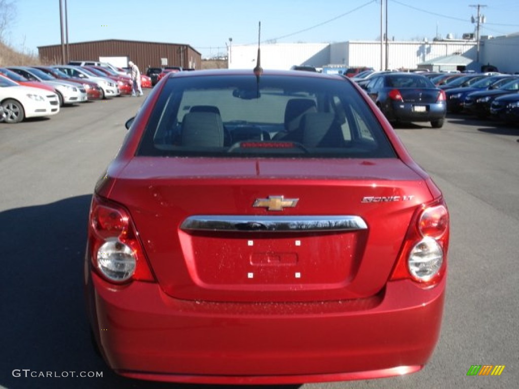 2012 Sonic LS Sedan - Crystal Red Tintcoat / Jet Black/Dark Titanium photo #7